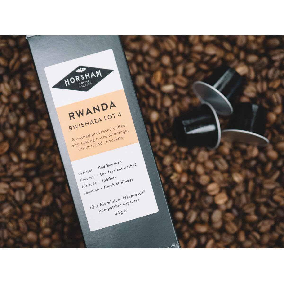 Rwanda coffee capsules in box with beans