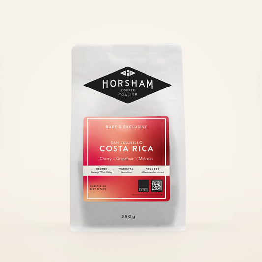 Horsham Coffee Roaster coffee package with a red and white label on a light gray background